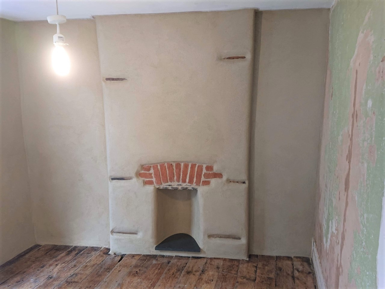 Lime Plastering Fireplace Cornwall